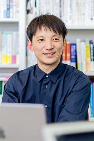 写真：田中 聡さん（立教大学 経営学部 准教授）