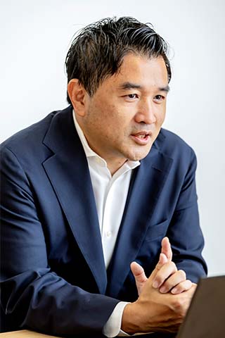 写真:松田 泰秀さん(ウェルネス・コミュニケーションズ株式会社 代表取締役社長)