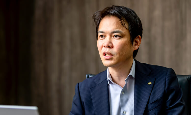 写真：真坂 晃之さん エーザイ株式会社 執行役 チーフHRオフィサー（兼）コーポレートコミュニケーション担当（兼）サステナビリティ担当（兼）総務担当