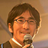 嘉村 賢州 氏